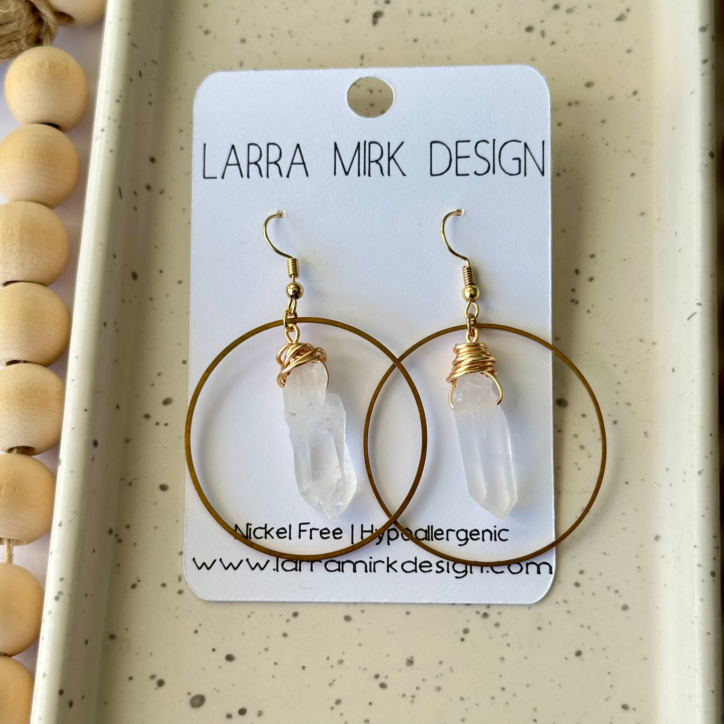 CRYSTAL QUARTZ POINT CIRCLE EARRINGS