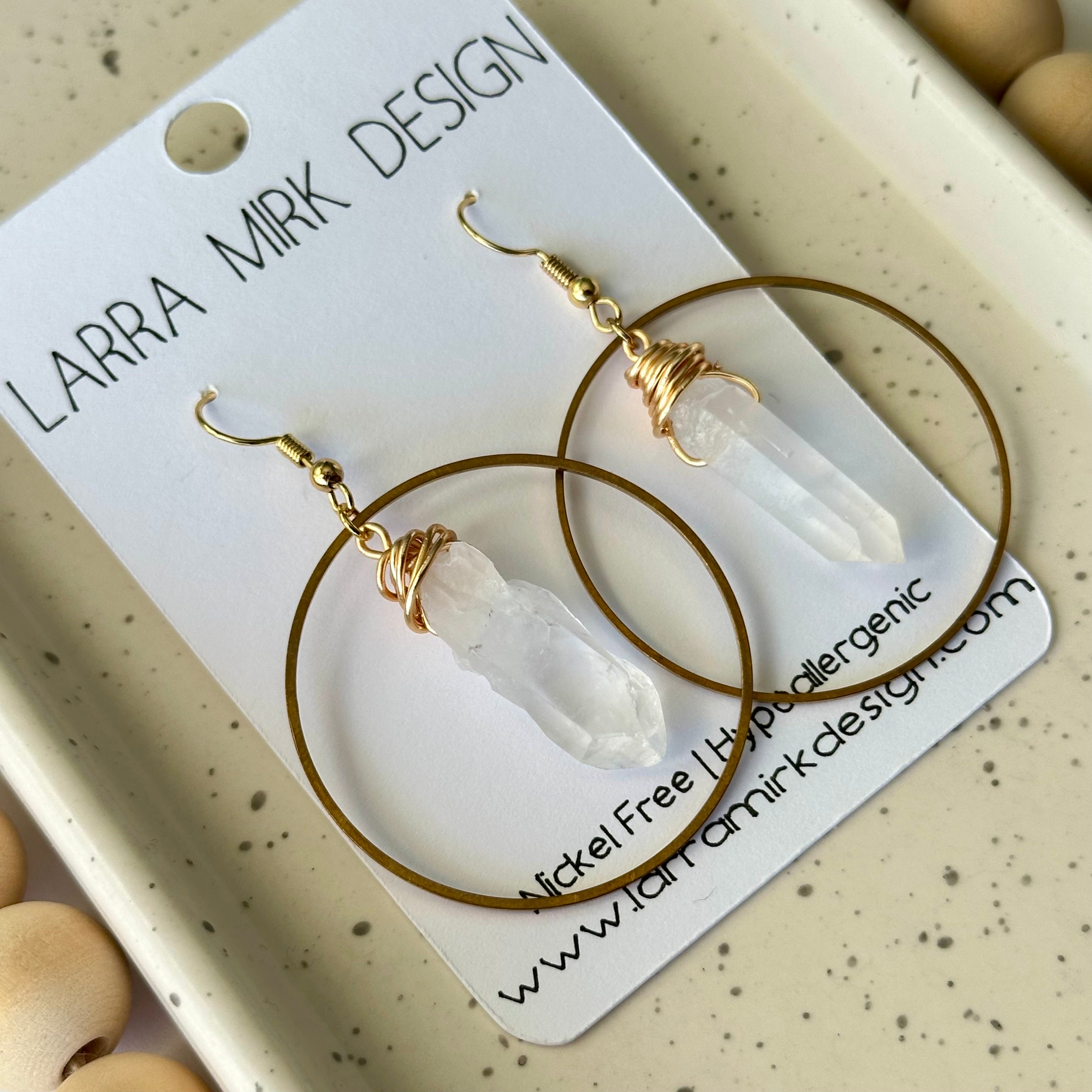 CRYSTAL QUARTZ POINT CIRCLE EARRINGS